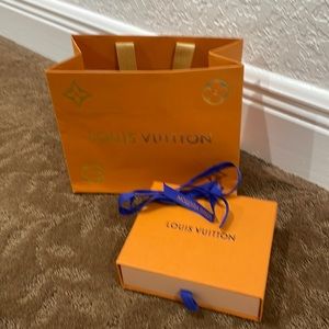 Louis Vuitton authentic shopping bag, wallet box, dust bag and blue LV ribbon